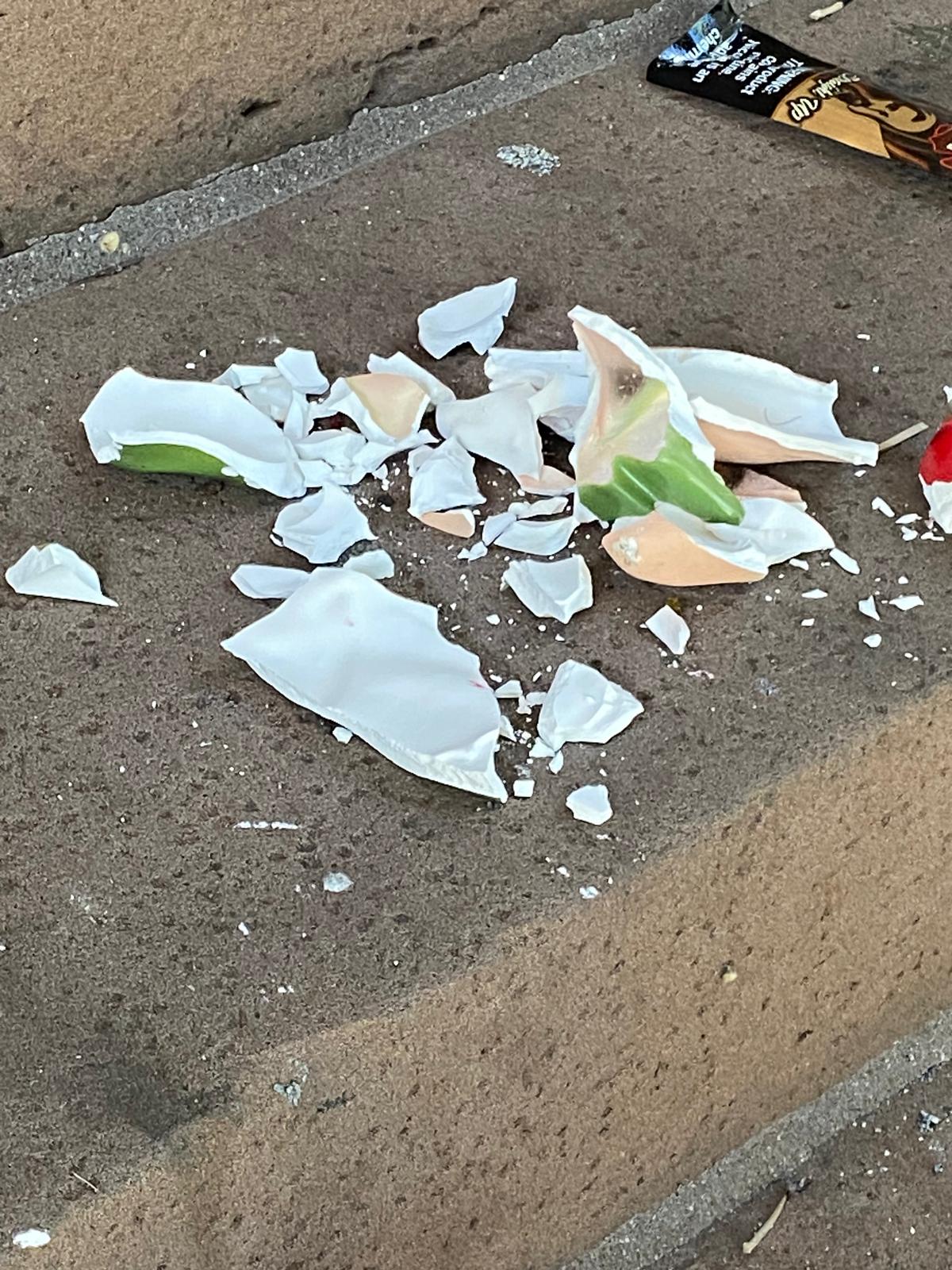 Smashed statue on the steps of St. Mary's Church
