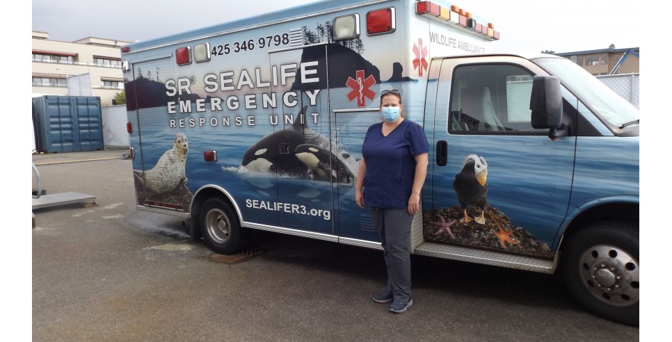 SR3 Executive Director Casey Mclean shows off the hospital’s wildlife ambulance. Photo credit  Barbara McMichael